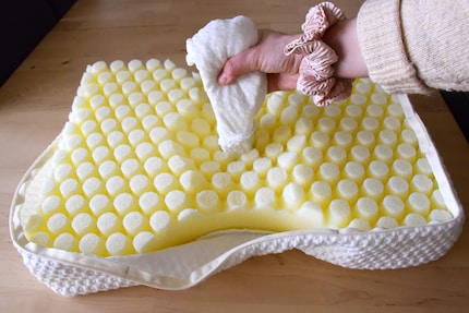 Pulling the fabric through the hole like a tissue box is a bit more awkward.