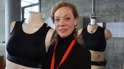 Founder Claudia Glass with the first versions of the new sports bra.