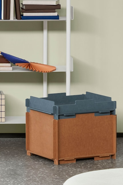 Cardboard boxes for stacking are light and save space.