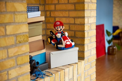 The buildable Mario cuts a fine figure as a display piece on the shelf.