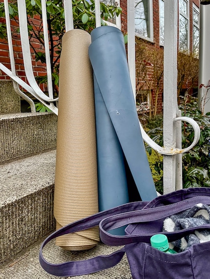 The test mat and my old, worn-out one on the way to the yoga studio.