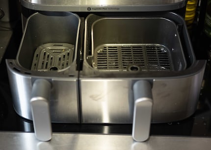 The two drawers hold three litres and six litres and they magically attract fingerprints