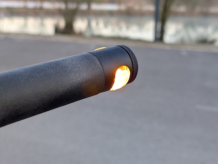The indicators are integrated directly into the handlebars.