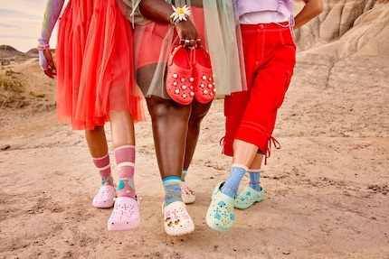 The Classic Floral Cut-Out Clog is available in various colours.