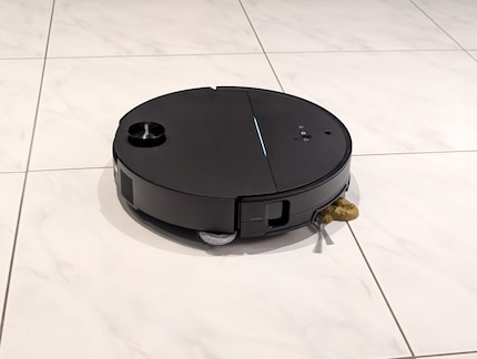 The robot simply drives over the artificial dog poo.