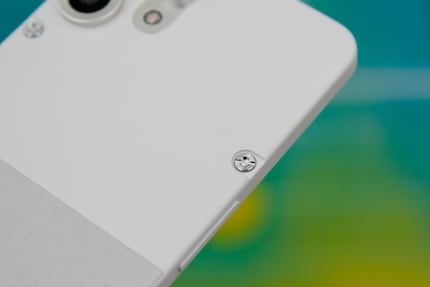 The screws are still noticeable but the back is firmly fixed.