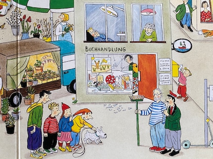 Susanne est dans la librairie d'Armin, Armin devant, un balai à la main.