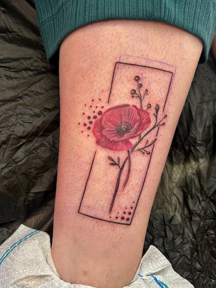 And this is the very fresh tattoo on the leg. You can even still see the lines from the first, slightly crooked drawing.