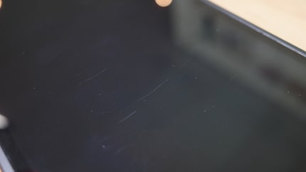 I have no idea where the vertical scratches are coming from. Maybe from the dock?
