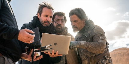 Denis Villeneuve (holding the laptop) is directing the new James Bond film.