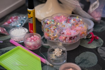 Anything goes. Sequins, bows or whatever else you fancy. It’s worth checking out thrift shops for these things.