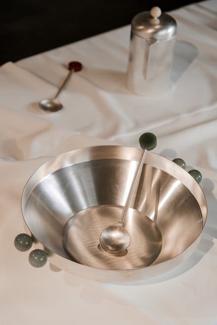 In this salad bowl, green quartz meets silver-plated brass.