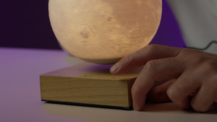 You can change the light colours with a tap on the base.
