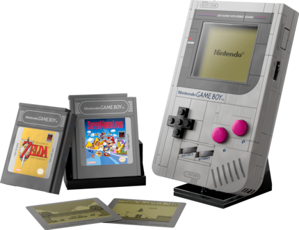Vue complète du set avec Game Boy, modules et éléments d'image interchangeables pour l'écran.