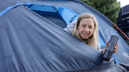 In the morning, I enjoy my first sip of coffee in the tent.