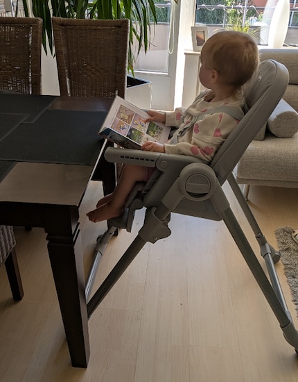 If there's nothing to eat, the tray goes away. The child sits comfortably, just can't get up on its own