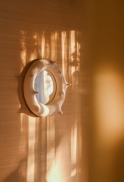 A mirror by Hot Wire Extensions, 2024.