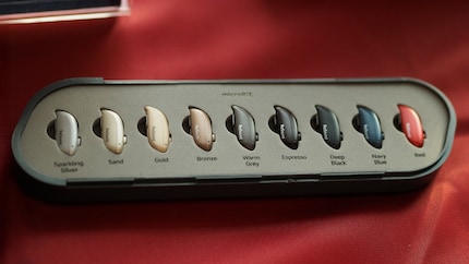 The small AI hearing aids from ReSound come in all kinds of colours.