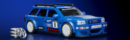 L'Audi RS2 Avant à l'échelle 1:32 avec portes ouvrantes et toit amovible.